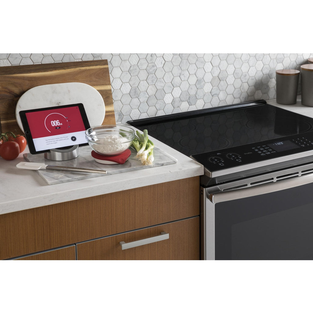 GE Profile Cuisinière encastrable électrique induction de 30 po. avec technology convection européenne véritable PCHS920YMFS - VENTE FINALE - BOITE OUVERTE - VENDU TEL QUEL - Germain Larivière