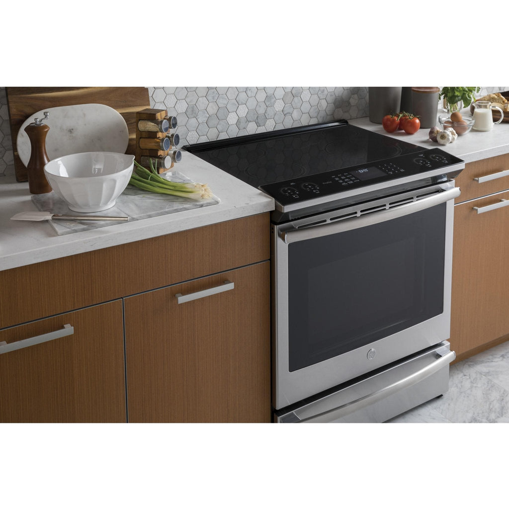 GE Profile Cuisinière encastrable électrique induction de 30 po. avec technology convection européenne véritable PCHS920YMFS - VENTE FINALE - BOITE OUVERTE - VENDU TEL QUEL - Germain Larivière